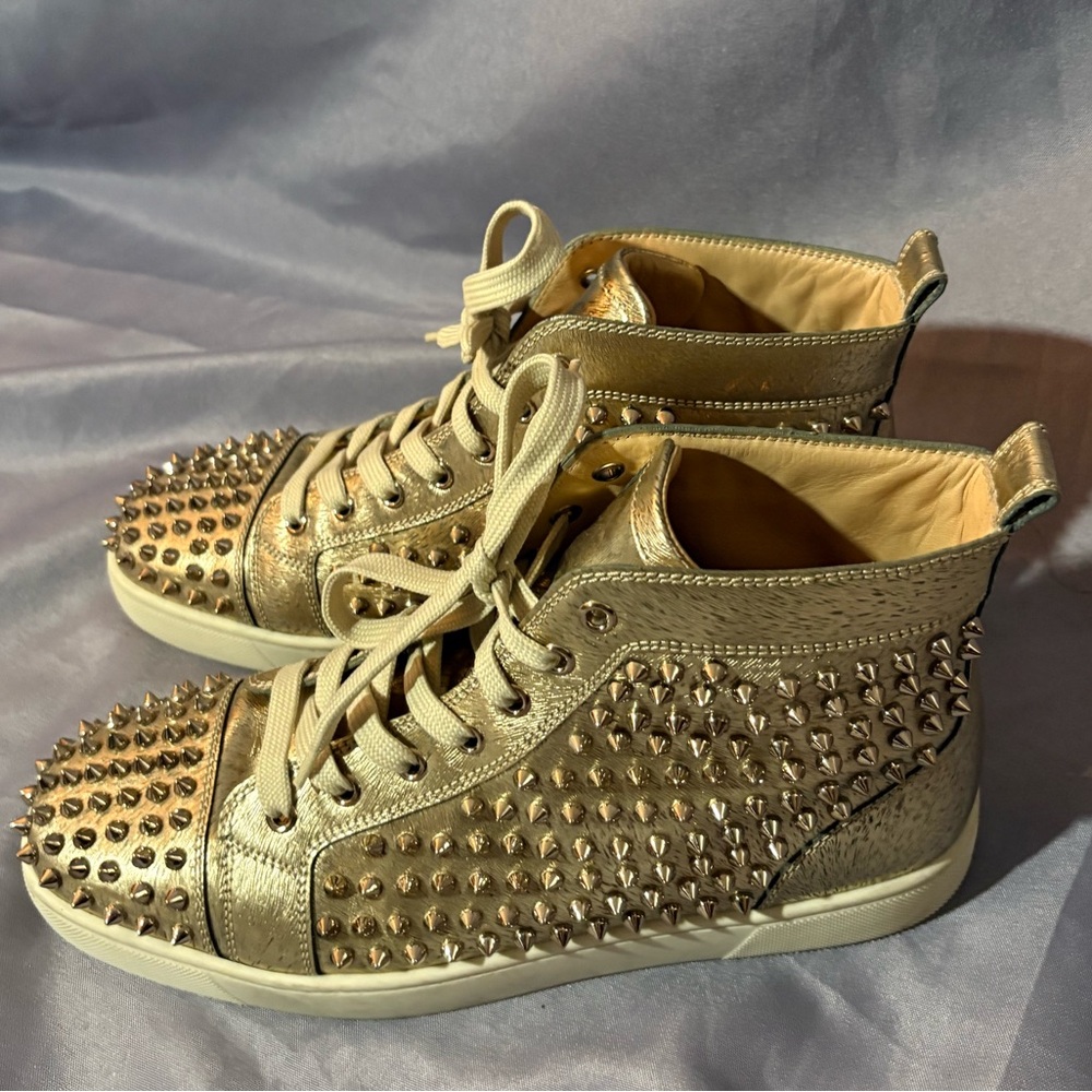 Men’s Christan Louboutin Gold spiked high top, Size 41.5